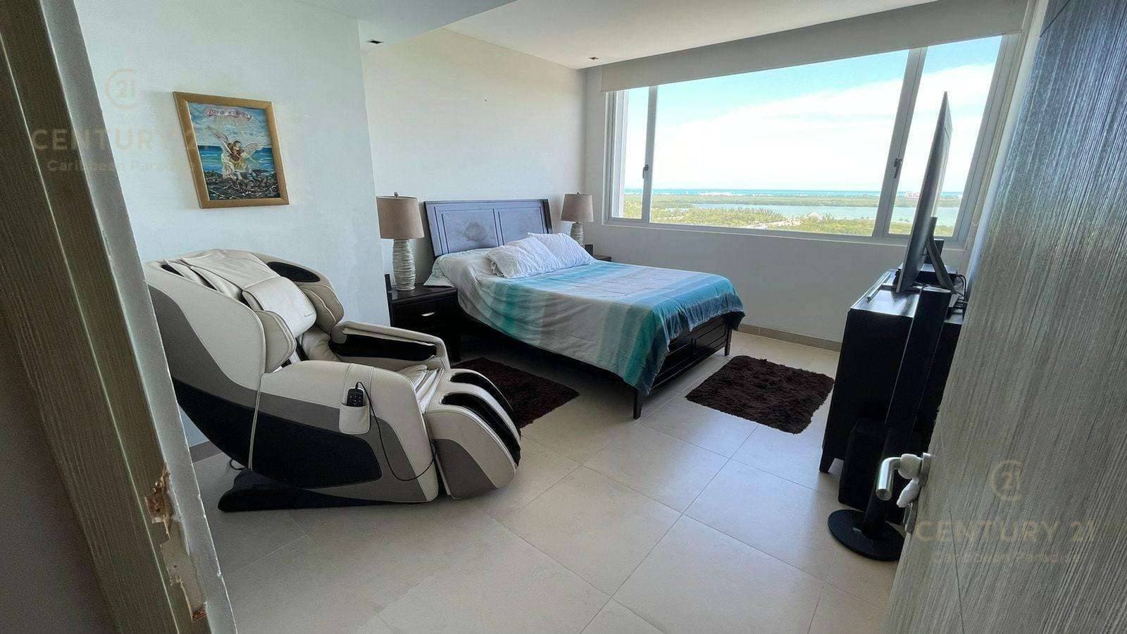 https://yo-rento.s3.us-east-2.amazonaws.com/properties/2035/1771551825405-recamara-vista-laguna-malecon-americas-cancun.jpeg